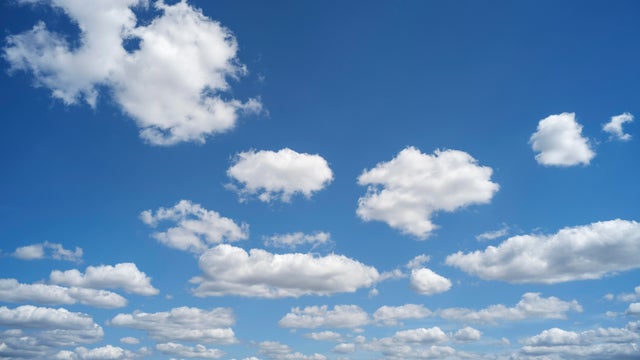 White fluffy clouds sky 