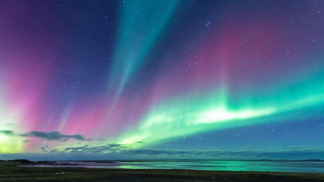 Aurora over sea in Iceland near from Eastfjords 